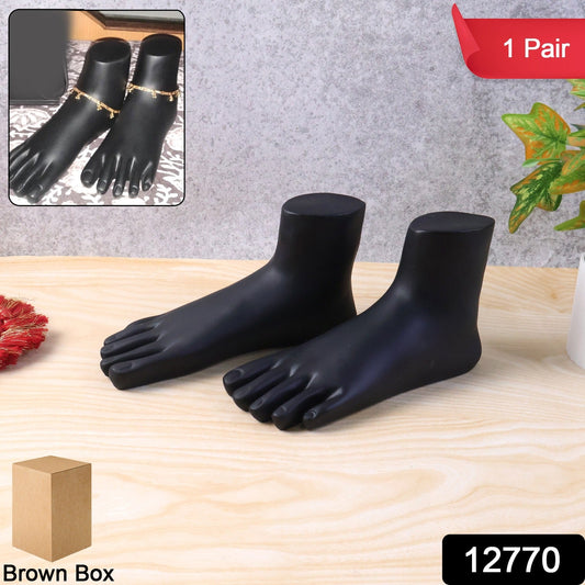 Side view of black foot mannequin display stand pair for showcasing anklets and toe rings